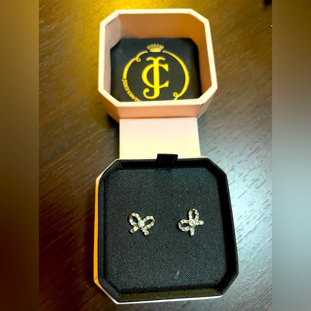 One pair of Juicy Couture Gemstone bow studs